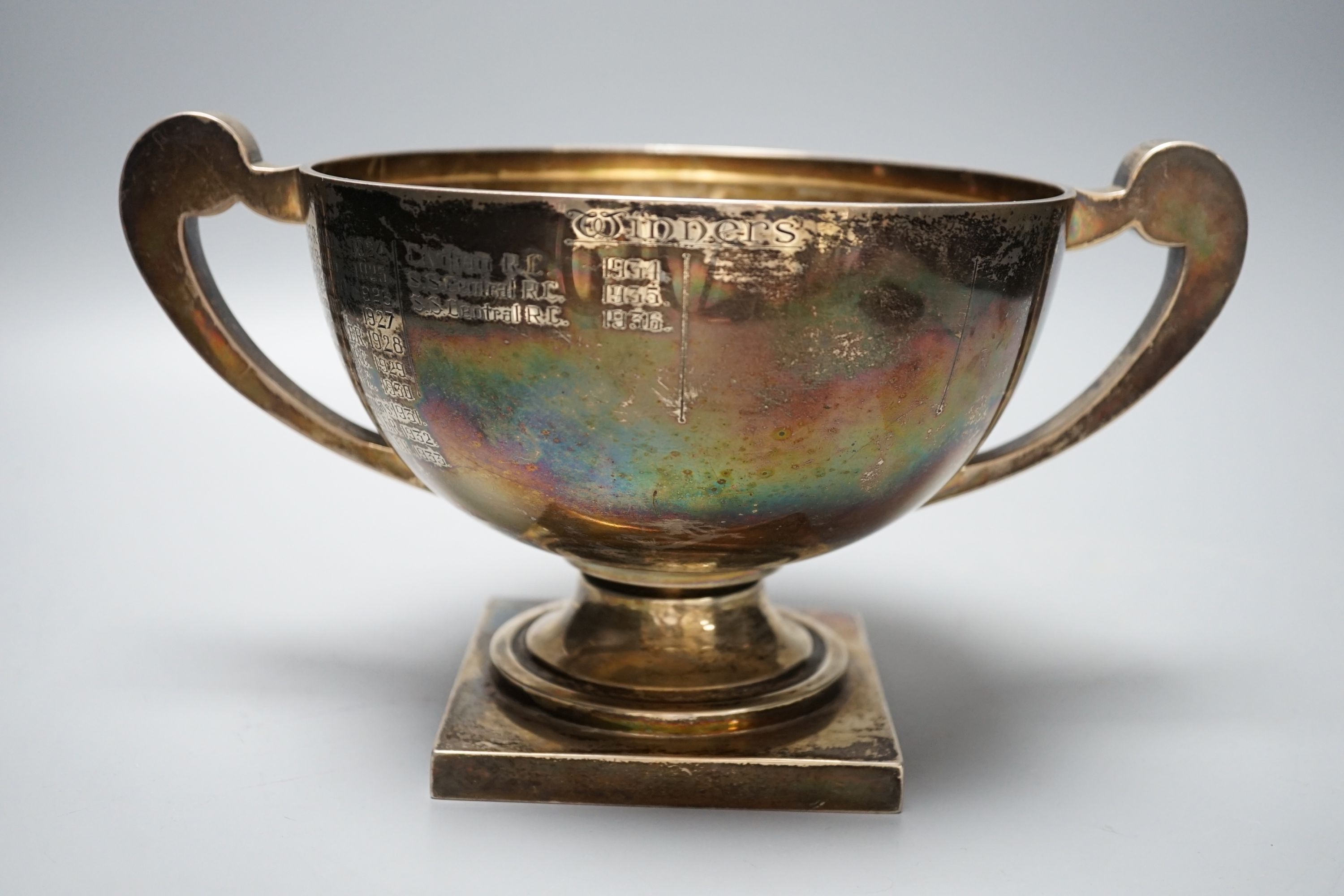 A George V silver two handled presentation trophy cup, with engraved inscription, William Neale Ltd, Birmingham, 1919, diameter 17.3cm, 19.5oz.